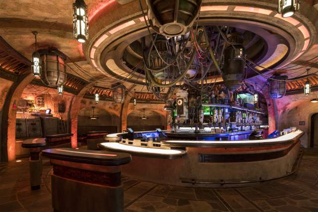 When guests visit Star Wars: Galaxy’s Edge at Disneyland Park in California and opening Aug. 29, 2019, at Disney’s Hollywood Studios in Florida, they’ll find Oga’s Cantina – a local watering hole where galactic travelers unwind, conduct business and maybe even encounter a friend. Patrons of the cantina can sample the famous concoctions created with exotic ingredients using “otherworldly” methods. (David Roark, photographer)