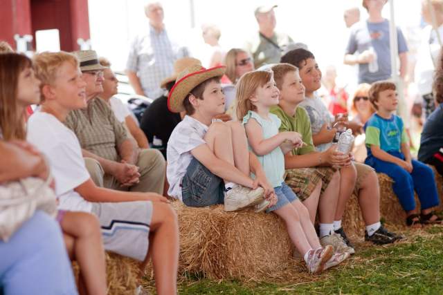 Children watch a show at the Kutztown Folk Festival