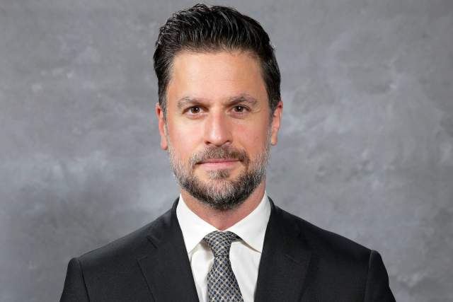 Photos of Chris Armstrong in a suit