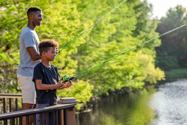 Father and son fishing at Caribe Royale Orlando