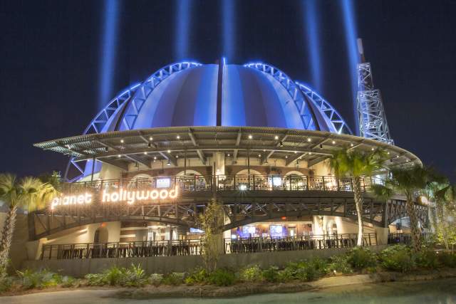Planet Hollywood exterior at night with water
