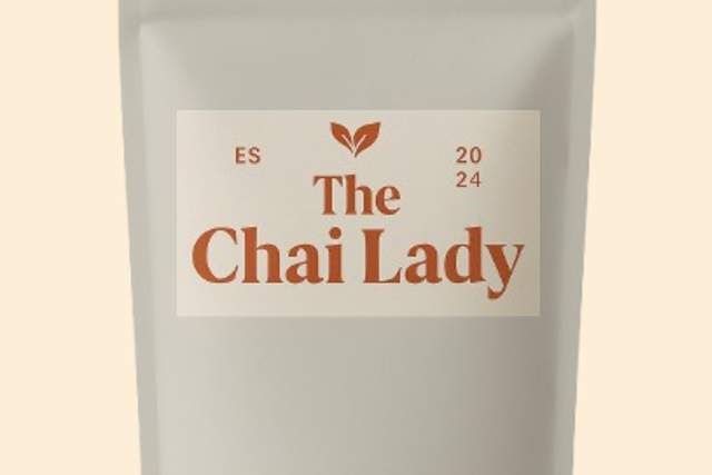 Package of "The Chai Lady" tea with a NM True Certified label, set against a plain background.