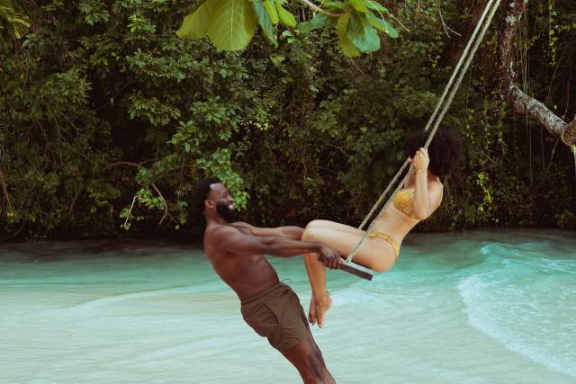 Image of a couple on swing