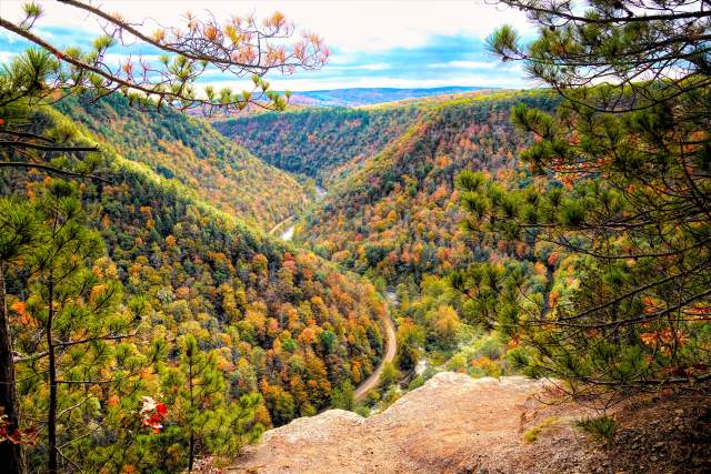 Landscape view looking out over a river gorge with fall foliage