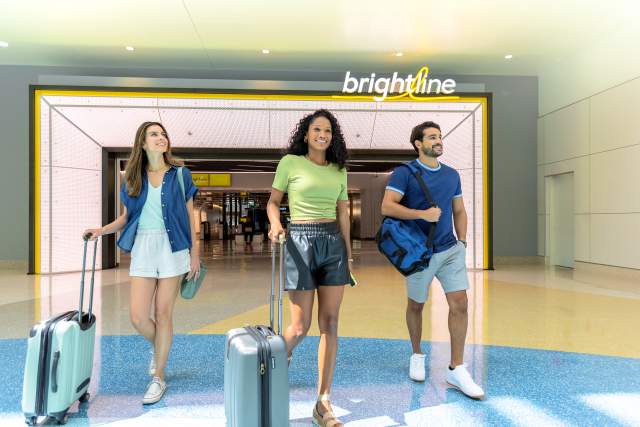 Friends arriving at Brightline train station