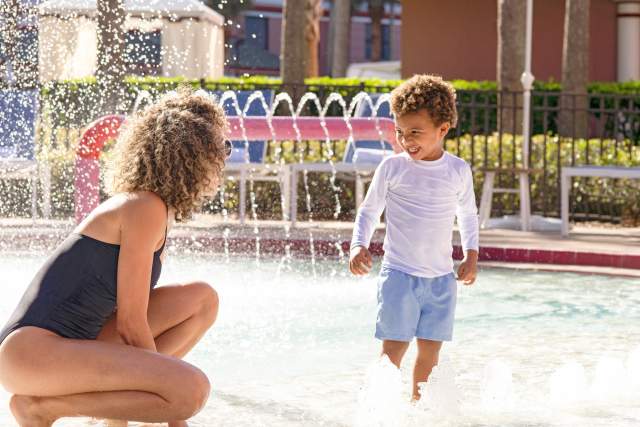 Mother and son at kiddie pool at Caribe Royale Orlando