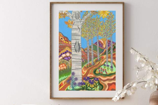 abstract colorful portrait of a tree on a mountainside, hanging on a white wall above a dresser with a small container and potted flower on top