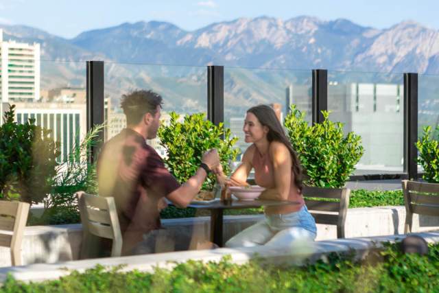 Couple eating at Mar Muntanya in SLC.