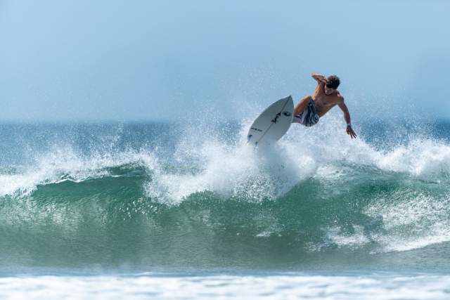 Surfer at Playa Venao, Azuero, Los Santos province, Panamá
