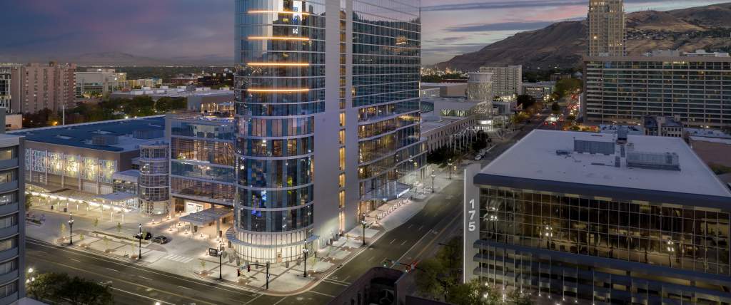 Hyatt Regency hotel attached to the Salt Palace Convention Center and surrounding area at twilight