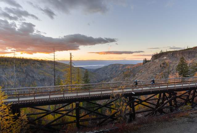 Couple Biking at Myra Canyon Trestles