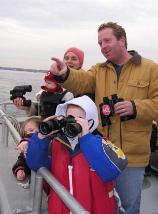 Family on Save The Bay Seal Watch Cruise (tour in Newport, photo can also represent Westerly cruises).