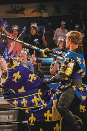 Knight giving favor to girl at Medieval Times Dinner & Tournament