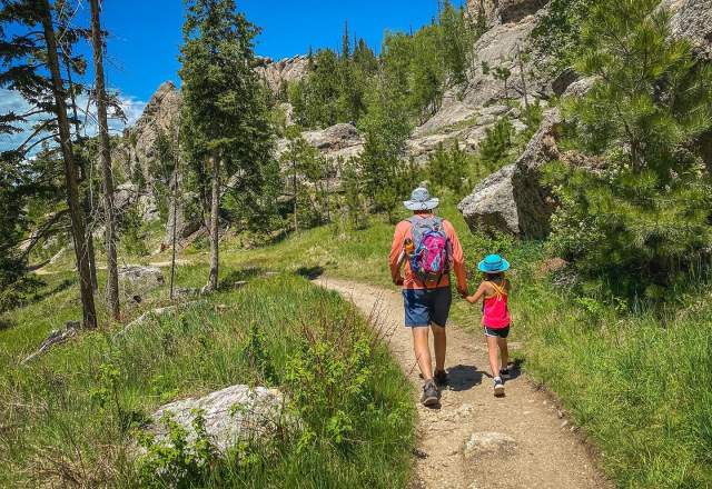 Man and daughter hiking in the black hills