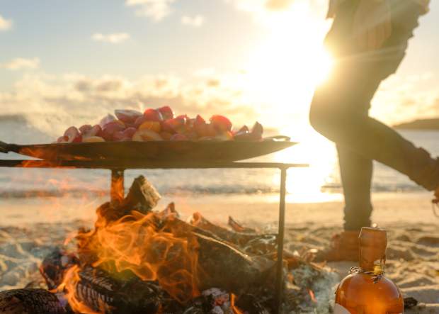 Cooking food on a beach