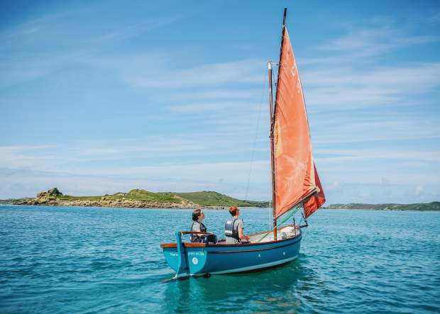 Family sailing around the islands