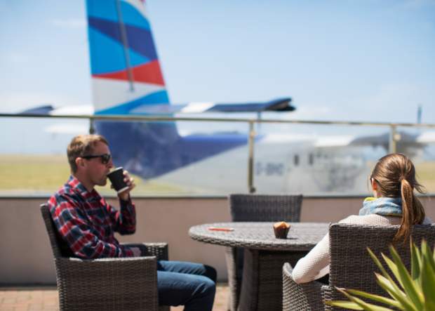 Couple waiting to board Skybus at Land's End Airport