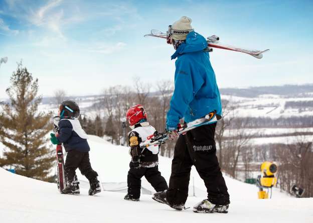 People walking on ski hill