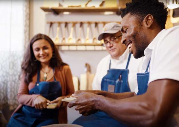 people having fun at Galena Country spoon carving workshop