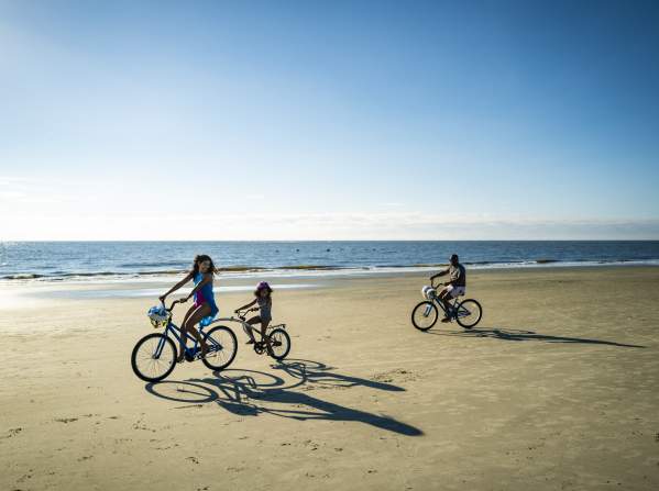 The hard packed sands on St. Simons Island's East Beach makes it perfect for riding bikes.