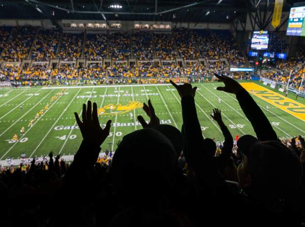 crowd cheering NDSU football in the FARGODOME