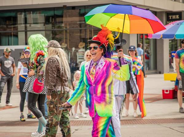 Women smiling in the Pride Parade