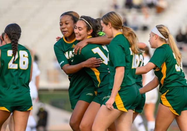 girls cheering on the field