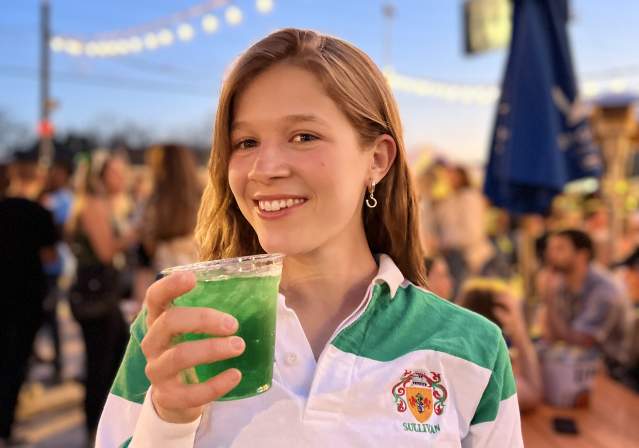 Woman Enjoying a Green Beverage for St. Patrick's Day
