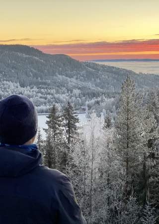 Solnedgang over tåka ved Damtjern