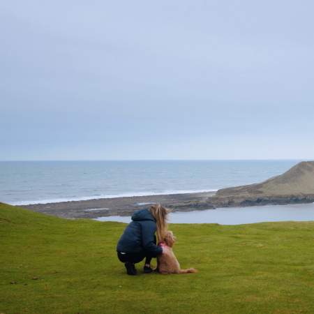 Lady and dog in Rhossili