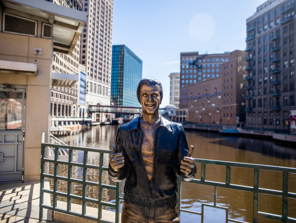 a bronze statue of the Happy Days character The Fonz on the Milwaukee RiverWalk