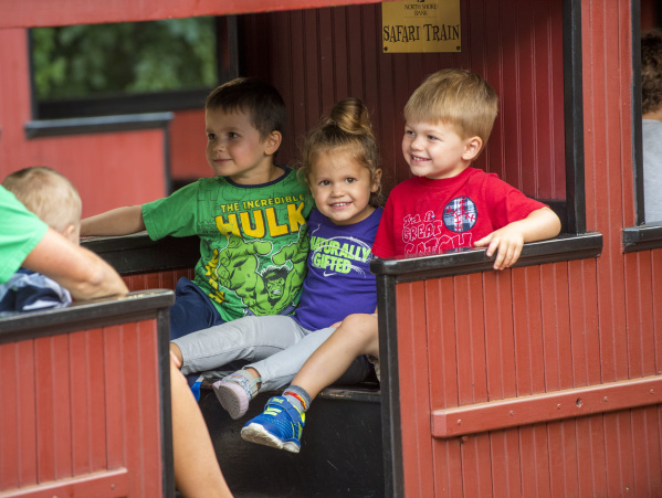 A family on the train at the Milwaukee County Zoo