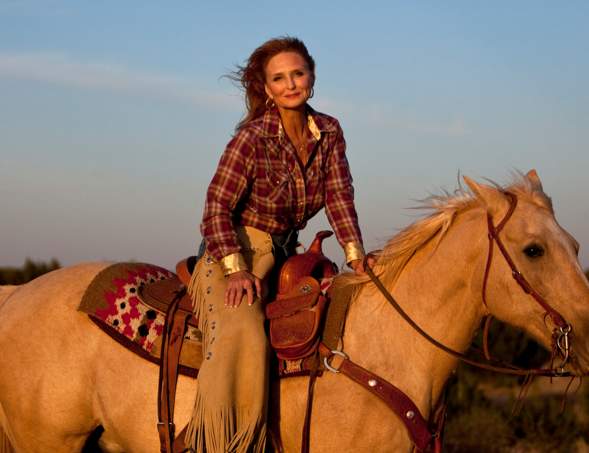 Woman riding horseback