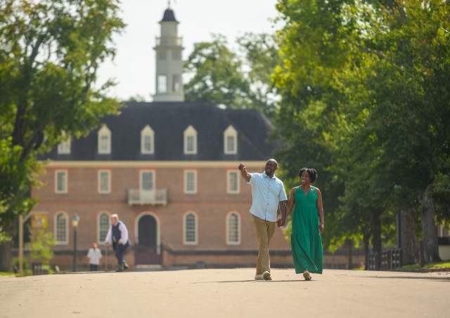 Couple walking around Colonial Williamsburg