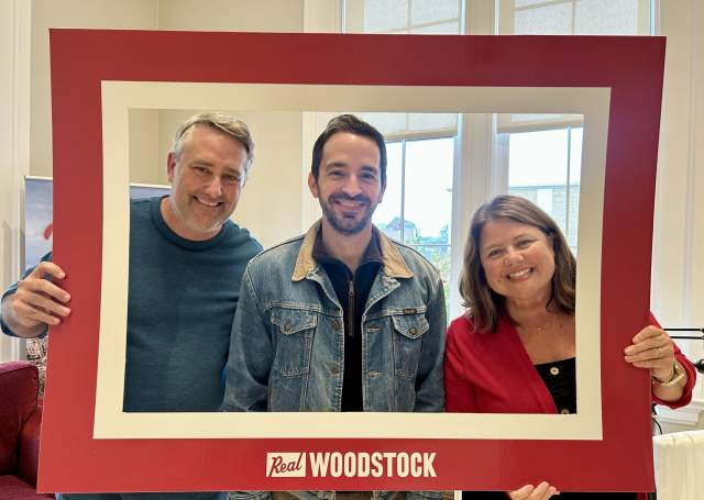 Jason, Nathan and Heather inside red Real Woodstock Picture Frame