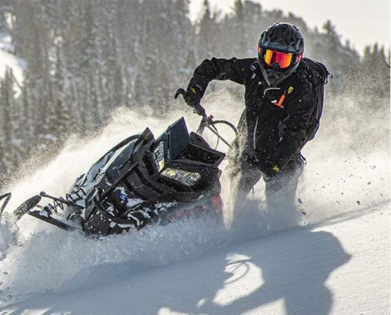 Man On Snowmobile In Jackson Hole