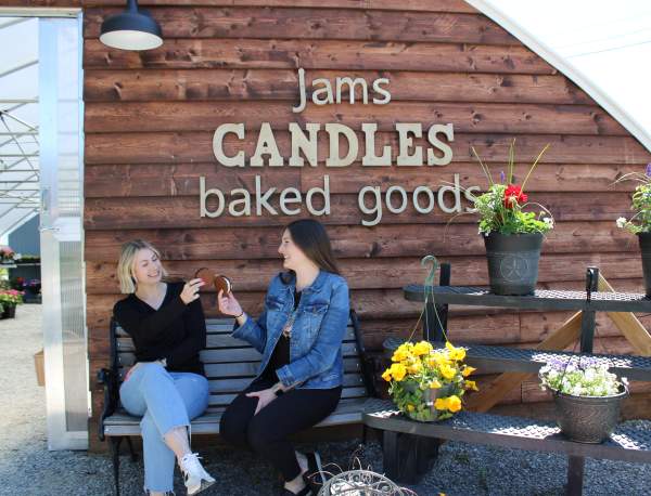 two women enjoying locally made ice cream at White Clover Farm