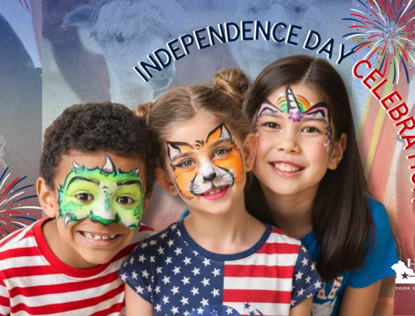children with their face painted and people celebrating the Fourth Of July