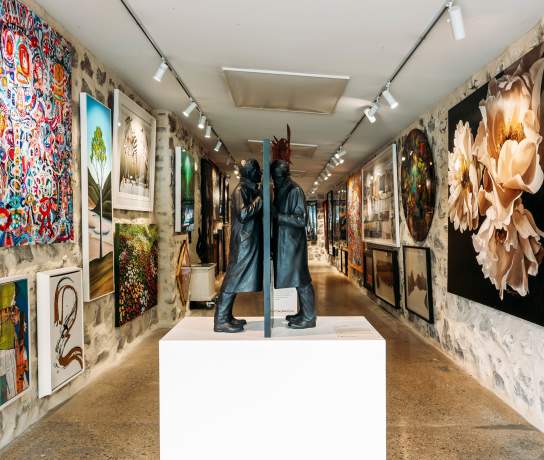 Interior shot with eclectic art at Art Bay Gallery