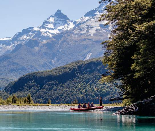 Group on Funyak tour with snow-capped mountains in the background