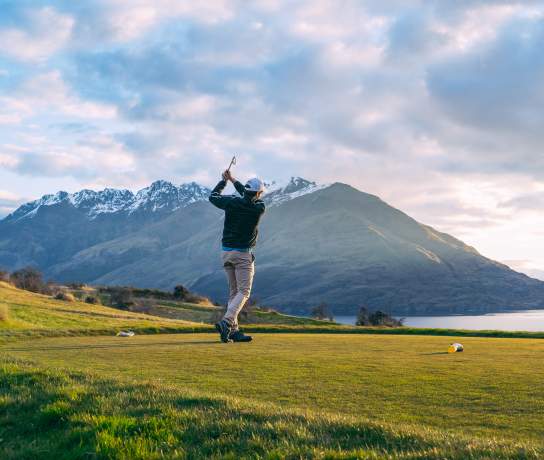 Man playing golf at Jack's Point in Spring