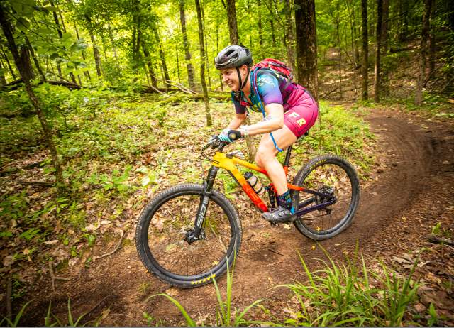 A mountain biker competes in the XTERRA North American Championship on the trails at Oak Mountain State Park.