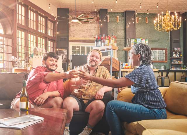 friends toasting with wine glasses