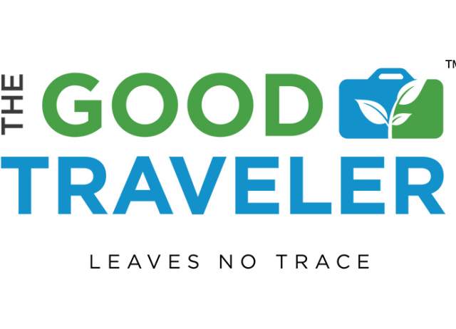 The Good Traveler logo in green and blue text