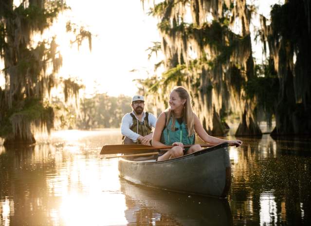 Couple Paddling at Lake Martin in Breaux Bridge, Louisiana