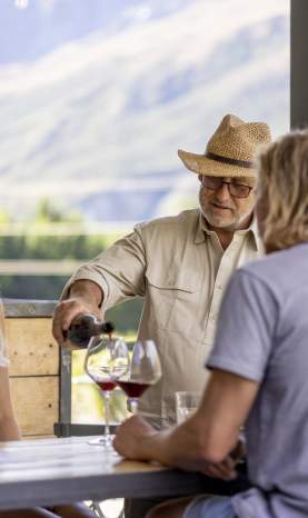 People enjoying a wine tasting in summer at Mt Rosa Wines