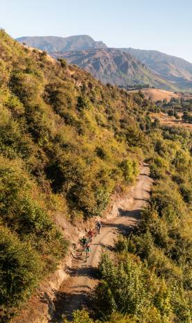 Aerial view of lake and mountains in the distance
