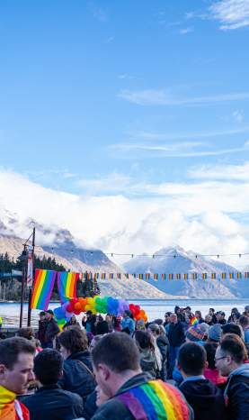 People celebrating Pride on Queenstown waterfront