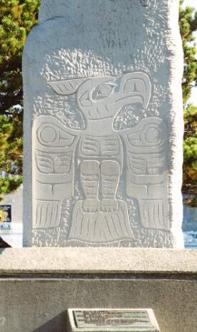 A public art sculpture of Indigenous work on stone.