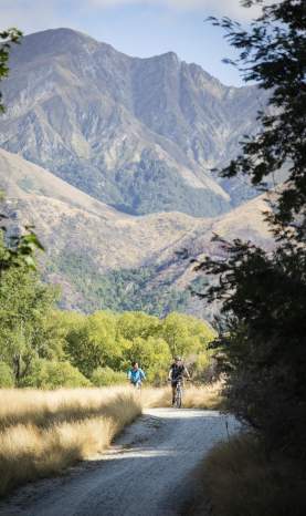 Two people biking